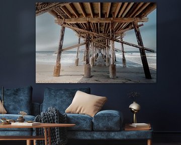 Pier on the beach in California by Fabian Krebs