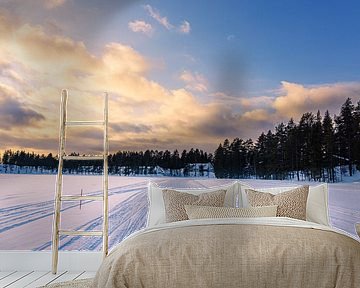 Landscape with snow and sunset in winter near Kuusamo,