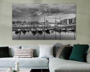 Amsterdam harbour in black and white - cityscape with historic ships