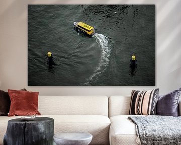 Water taxi Rotterdam sails between the dukdalves! by Arthur Scheltes