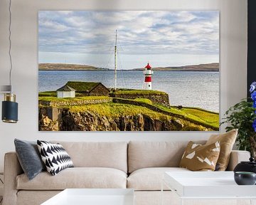 Lighthouse in the town of Tórshavn on the Faroe Islands by Rico Ködder