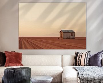 Single Building in Arid Landscape with Tire Tracks by Markus Gann