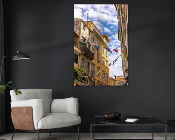 Colourful flags above the streets