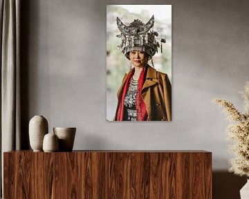 Portrait of a woman in traditional Miao dress, photographed in Fenghuang Ancient Town, Hunan, China.