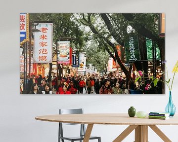 Lively street full of colour and movement in the Muslim Quarter, Xi'an, China. by Diederik De Mezel