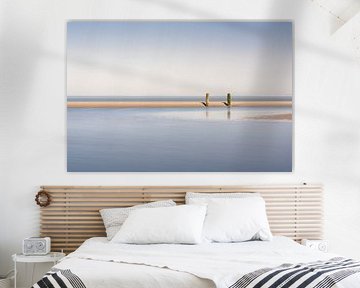 Deux brise-lames à marée basse en Zélande