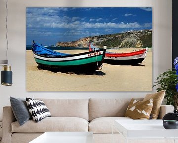 Old wooden boats, fishing boats, on the beach of Nazare'. Mimosa Nazare. Portugal. by Iris Heuer