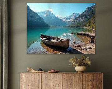 An old rowing boat lies on the shore of a mountain lake by Rüdiger Rebmann