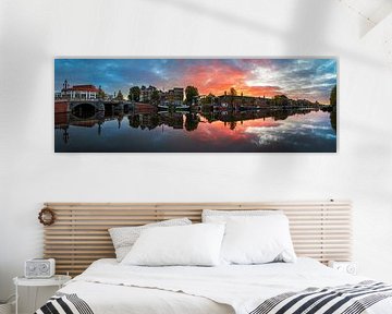 View of the Amstel River (east side) and the Walter Süskind Bridge in Am