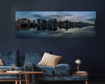 View of the Amstel River (east side) and the Walter Süskind Bridge in Am