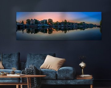 View of the Amstel River (east side) and the Walter Süskind Bridge in Am