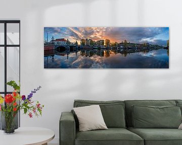 View of the Amstel River (east side) and the Walter Süskind Bridge in Am by Amsterdam.Photos