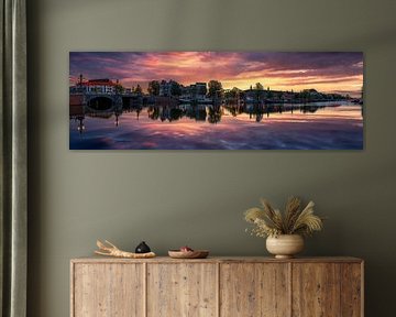 View of the Amstel River (east side) and the Walter Süskind Bridge in Am