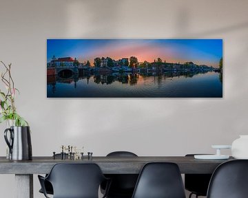 View of the Amstel River (east side) and the Walter Süskind Bridge in Am