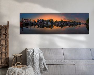 View of the Amstel River (east side) and the Walter Süskind Bridge in Am