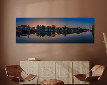 View of the Amstel River (east side) and the Walter Süskind Bridge in Am by Amsterdam.Photos