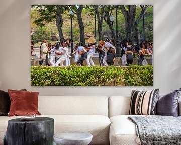 Young people dance in a park in Havana, Cuba