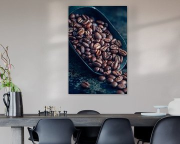 Coffee ritual - roasting beans in the metal scoop