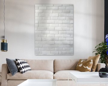 Mur de briques blanches à la structure fine