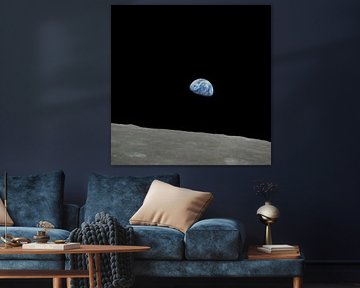 Earth rising over the lunar horizon by NASA and Space