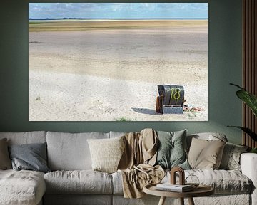 Beach chair in the Wadden Sea on the North Sea by Alexander Baumann