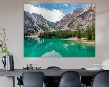 The turquoise-coloured Lago di Braies is nestled quietly between the steep rock faces of the Dolomites. Mirror-smooth water by Miriam Schwarzfischer Fotografie