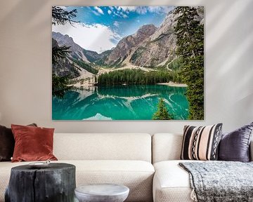 The turquoise-coloured Lago di Braies is nestled quietly between the steep rock faces of the Dolomites. Mirror-smooth water by Miriam Schwarzfischer Fotografie