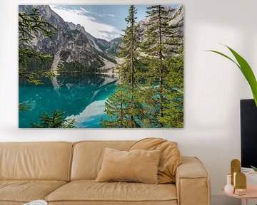 The turquoise-coloured Lago di Braies is nestled quietly between the steep rock faces of the Dolomites. Mirror-smooth water by Miriam Schwarzfischer Fotografie