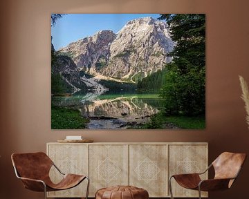 The turquoise-coloured Lago di Braies is nestled quietly between the steep rock faces of the Dolomites. Mirror-smooth water by Miriam Schwarzfischer Fotografie