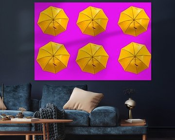 Yellow umbrella's on pink by Patricia Hofmeester