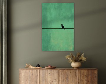 Oiseau silencieux sur une ligne