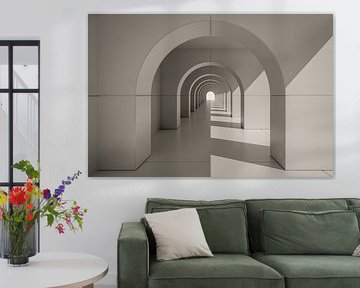 An typical archway centered with light from right  by Markus Gann