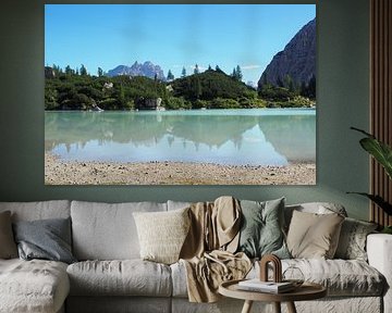 The turquoise-coloured Lake Sorapis is nestled in the dramatic rocky backdrop of the Dolomites and looks like a magical place from another world - wild, clear and breathtakingly beautiful. by Miriam Schwarzfischer Fotografie