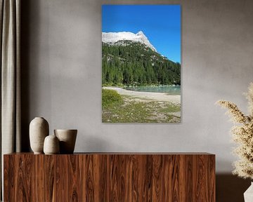 The turquoise-coloured Lake Sorapis is nestled in the dramatic rocky backdrop of the Dolomites and looks like a magical place from another world - wild, clear and breathtakingly beautiful. by Miriam Schwarzfischer Fotografie