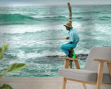 Lokale visser op een paal in Sri Lanka