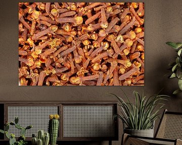 Clous de girofle entiers séchés formant une texture de fond d'épices aromatiques sur de-nue-pic