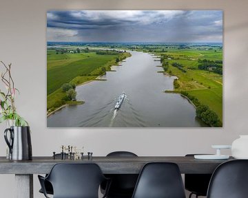 Freight ship on the Lek river with rain clouds above by Sjoerd van der Wal Photography