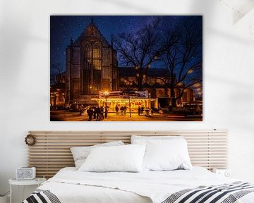 Queuing for the oliebollenkraam at the Grote Kerk in alkmaar by peterheinspictures