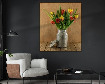 red and yellow tulips on wood