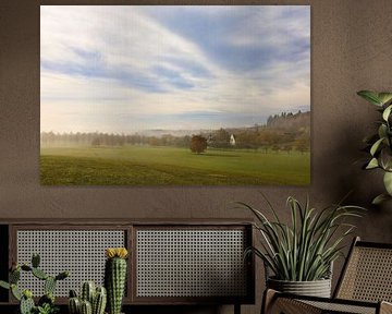 Hofgut Dauenberg near Eigeltingen with chapel and remnants of fog on an autumn day in Hegau