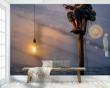 Fischer mit Licht über dem Meer in der Abenddämmerung