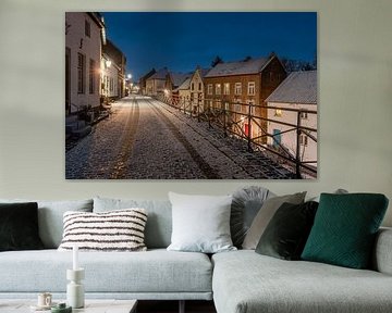 Elsloo in de avond in de winter met sneeuw