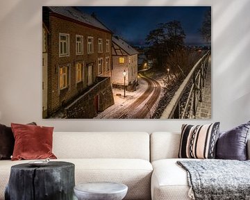 Elsloo in de avond in de winter met sneeuw