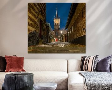 Elsloo in de avond in de winter met sneeuw