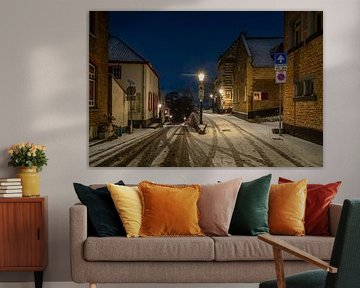 Elsloo in the evening in winter with snow