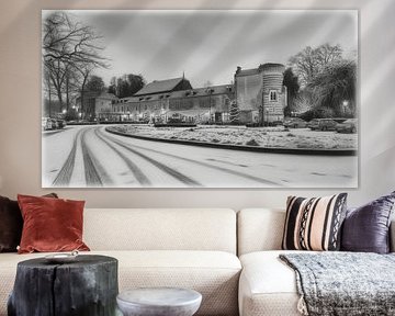 Elsloo am Abend im Winter mit Schnee in Holzkohle