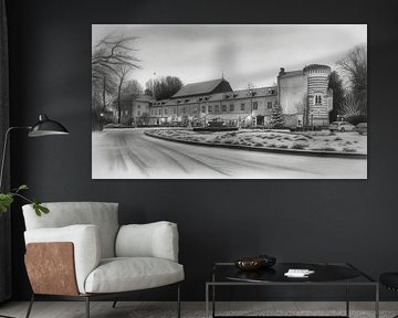 Elsloo am Abend im Winter mit Schnee in Holzkohle