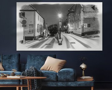 Elsloo am Abend im Winter mit Schnee in Holzkohle