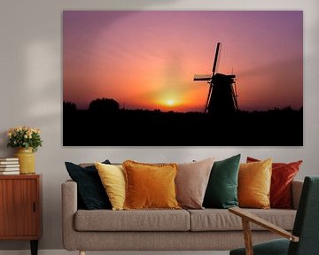 Dutch Windmill at sunset sur Matthijs Veltmeijer