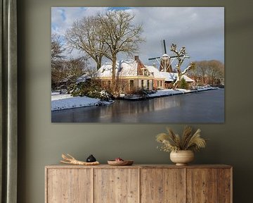 Molen de Ster in Utrecht met woning op voorgrond in de Winter